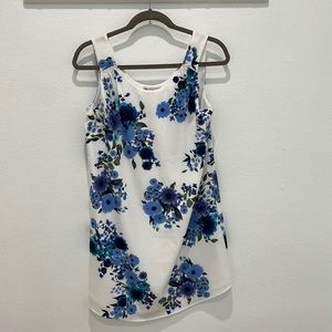 White dress with blue flowers